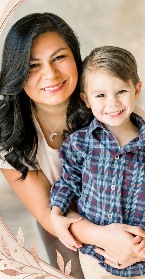 A mother embracing her smiling young son